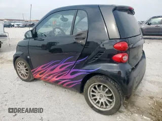 2011 Smart fortwo Pure with VIN WMEEJ3BA4BK447028, listed as a Copart auction lot 57359265 with 84,657 mi miles and Clean title. Bid and sale history available at DreamBid. Image 2.