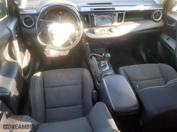 2017 Toyota RAV4 Hybrid XLE with VIN JTMRJREV6HD076453, listed as a Copart auction lot 83603334 with 104,728 mi miles and Salvage Title. Bid and sale history available at carsss.com. Image 8.