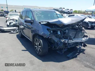 2019 Honda Pilot Touring 7-Passenger z VIN 5FNYF5H68KB002509, wystawiony jako IAAI lot #42517995 z przebiegiem Nie podano mil oraz . Historia ofert i sprzedaży dostępna na DreamBid. Obrazek 1.