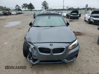 2015 BMW 2 Series 228i with VIN WBA1K5C57FV474037, listed as a Copart auction lot 87857635 with 91,333 mi miles and Salvage title. Bid and sale history available at DreamBid. Image 5.