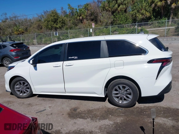 2023 Toyota Sienna LE with VIN 5TDKRKEC2PS173314, listed as a IAAI auction lot 41601728 with 50,873 mi miles. Bid and sale history available at carsss.com. Image 14.