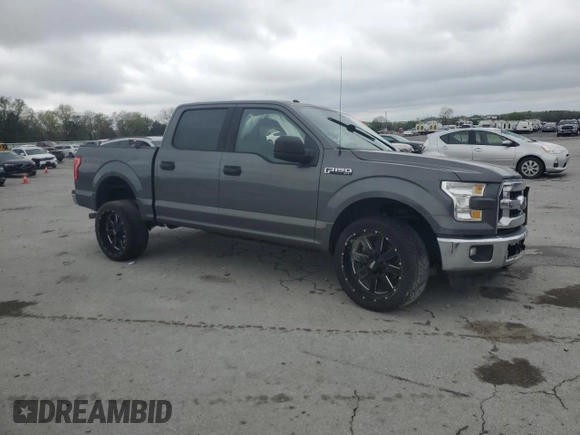 2016 Ford F-150 XLT with VIN 1FTEW1EF4GKE98094, listed as a Copart auction lot 52121985 with 125,000 mi miles and Salvage Title. Bid and sale history available at DreamBid. Image 4.
