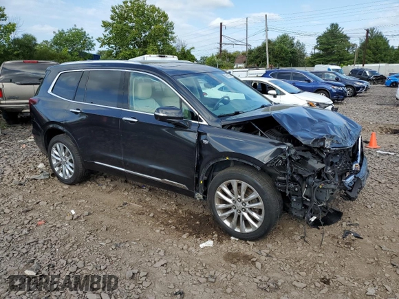 2020 Cadillac XT6 AWD Premium Luxury with VIN 1GYKPDRS4LZ103481, listed as a Copart auction lot 69148554 with 69,407 mi miles and Salvage title. Bid and sale history available at DreamBid. Image 4.