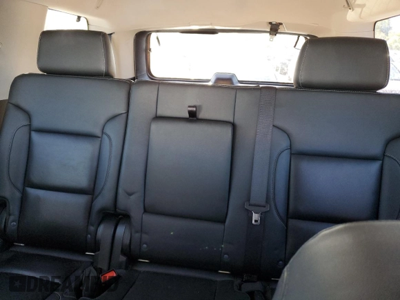 2020 Chevrolet Tahoe LT z VIN 1GNSKBKC5LR243378, wystawiony jako Copart lot #52690775 z przebiegiem 79 900 mil mil oraz Szkoda całkowita • Salvage title. Historia ofert i sprzedaży dostępna na DreamBid. Obrazek 10.