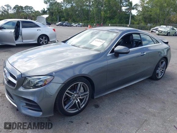 2018 Mercedes-Benz E 400 with VIN WDD1J6FB9JF015064, listed as a IAAI auction lot 42165914 with 95,290 mi miles and . Bid and sale history available at DreamBid. Image 2.