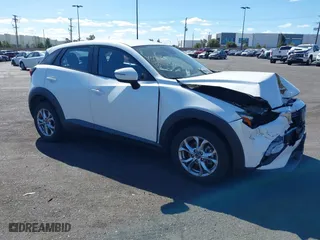 2021 Mazda CX-3 Sport with VIN JM1DKDB75M1500023, listed as a IAAI auction lot 41461424 with 65,162 mi miles. Bid and sale history available at carsss.com. Image 1.