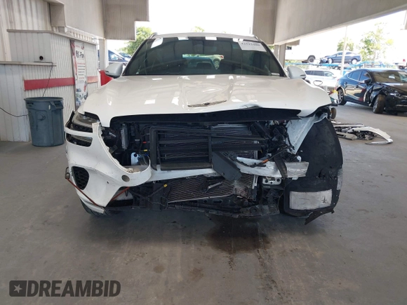 2022 Genesis GV70 2.5T with VIN KMUMADTBXNU045298, listed as a IAAI auction lot 42515480 with 82,599 mi miles and . Bid and sale history available at DreamBid. Image 13.