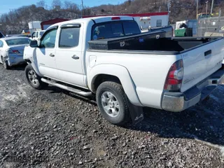2011 Toyota Tacoma with VIN 3TMLU4EN0BM064052, listed as a IAAI auction lot 41423819 with 185,729 mi miles. Bid and sale history available at carsss.com. Image 3.
