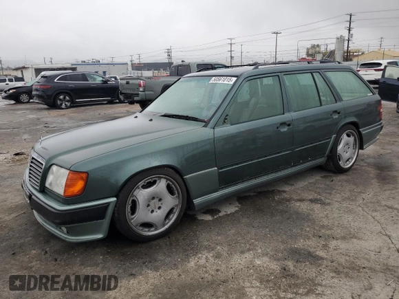 1993 Mercedes-Benz 300 with VIN WDBEA92E7PF259851, listed as a Copart auction lot 50561015 with 214,346 mi miles and Salvage Title. Bid and sale history available at DreamBid. Image 1.