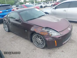 2003 Nissan 350Z Touring with VIN JN1AZ34E53T015620, listed as a IAAI auction lot 41877693 with 100,429 mi miles. Bid and sale history available at carsss.com. Image 1.