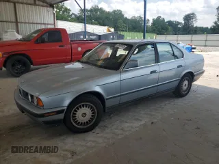 1990 BMW 5 Series with VIN WBAHC231XLGB21382, listed as a Copart auction lot 63957675 with 276,162 mi miles and Clean title. Bid and sale history available at DreamBid. Image 1.