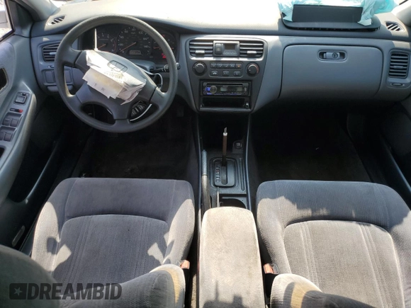 1999 Honda Accord LX z VIN 1HGCG5647XA024074, wystawiony jako Copart lot #56057575 z przebiegiem Nie podano mil oraz Szkoda całkowita • Salvage title. Historia ofert i sprzedaży dostępna na DreamBid. Obrazek 8.