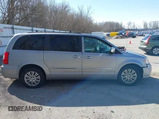 2013 Chrysler Town & Country Touring L with VIN 2C4RC1CG6DR660858, listed as a IAAI auction lot 41970976 with 140,299 mi miles and . Bid and sale history available at DreamBid. Image 13.