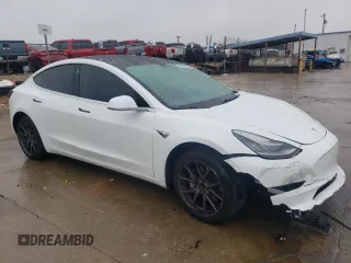 2019 Tesla Model 3 Mid Range with VIN 5YJ3E1EA8KF485000, listed as a Copart auction lot 42934895 with 70,850 mi miles and Salvage Title. Bid and sale history available at DreamBid. Image 4.
