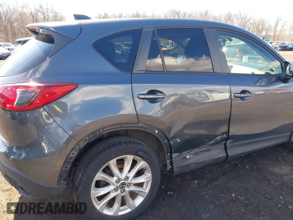 2013 Mazda CX-5 Grand Touring with VIN JM3KE4DE1D0164488, listed as a IAAI auction lot 41683326 with 129,989 mi miles. Bid and sale history available at carsss.com. Image 17.