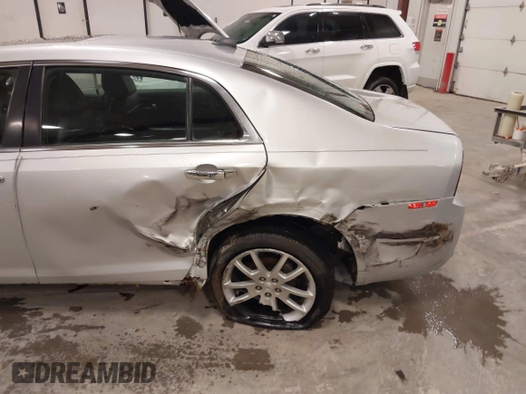 2012 Chevrolet Malibu LTZ with VIN 1G1ZG5E79CF205316, listed as a IAAI auction lot 41936446 with 133,578 mi miles and . Bid and sale history available at DreamBid. Image 6.