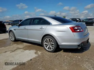 2013 Ford Taurus Limited with VIN 1FAHP2F84DG129904, listed as a Copart auction lot 58218205 with 105,877 mi miles and Salvage title. Bid and sale history available at DreamBid. Image 2.