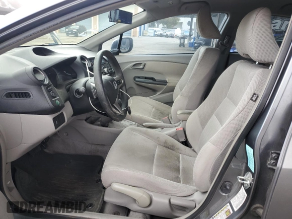 2011 Honda Insight EX with VIN JHMZE2H77BS006079, listed as a Copart auction lot 63873985 with 134,159 mi miles and Salvage title. Bid and sale history available at DreamBid. Image 7.