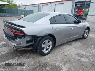 2015 Dodge Charger SXT with VIN 2C3CDXHG1FH886088, listed as a IAAI auction lot 42331369 with 119,659 mi miles and . Bid and sale history available at DreamBid. Image 4.