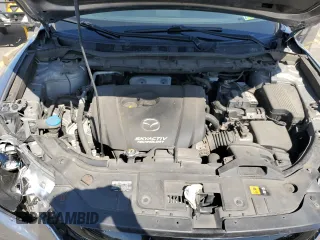 2014 Mazda CX-5 Grand Touring with VIN JM3KE4DY4E0305212, listed as a Copart auction lot 53145305 with 233,061 mi miles and Salvage Title. Bid and sale history available at carsss.com. Image 12.