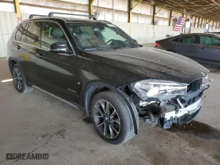 2018 BMW X5 xDrive40e iPerformance with VIN 5UXKT0C53J0W02429, listed as a Copart auction lot 51874485 with 57,480 mi miles and Salvage Title. Bid and sale history available at carsss.com. Image 4.