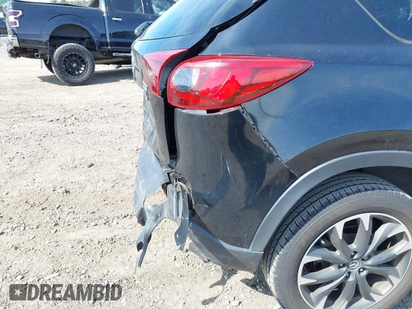2016 Mazda CX-5 Grand Touring with VIN JM3KE4DY8G0639570, listed as a IAAI auction lot 42098512 with 126,541 mi miles and . Bid and sale history available at carsss.com. Image 18.