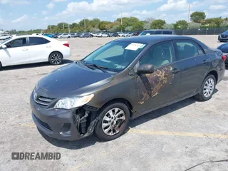 2013 Toyota Corolla L with VIN 2T1BU4EE7DC049698, listed as a IAAI auction lot 41978393 with 48,901 mi miles. Bid and sale history available at carsss.com. Image 2.