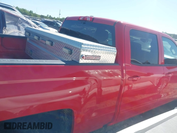 2018 Chevrolet Silverado 1500 LT with VIN 1GCUKREC0JF222376, listed as a IAAI auction lot 42121748 with 143,472 mi miles and . Bid and sale history available at DreamBid. Image 5.