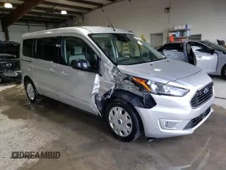 2022 Ford Transit Connect XLT with VIN NM0GE9F25N1515717, listed as a Copart auction lot 57802005 with 59,951 mi miles and Clean title. Bid and sale history available at DreamBid. Image 4.