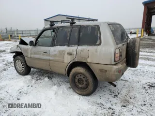 2000 Toyota RAV4 z VIN JT3HP10V9Y7166931, wystawiony jako Copart lot #83844934 z przebiegiem Nie podano mil oraz Czysty tytuł • Clean title. Historia ofert i sprzedaży dostępna na DreamBid. Obrazek 2.