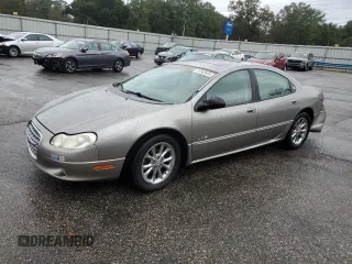1999 Chrysler LHS with VIN 2C3HC56G9XH685301, listed as a Copart auction lot 81353644 with 184,656 mi miles and Salvage Title. Bid and sale history available at carsss.com. Image 1.