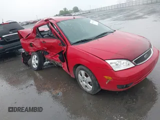 2007 Ford Focus S z VIN 1FAHP34N87W356022, wystawiony jako IAAI lot #41930661 z przebiegiem 181 921 mil mil oraz . Historia ofert i sprzedaży dostępna na DreamBid. Obrazek 1.