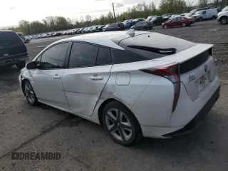 2016 Toyota Prius Four with VIN JTDKARFU2G3027374, listed as a Copart auction lot 51896125 with 128,734 mi miles and Salvage Title. Bid and sale history available at DreamBid. Image 2.
