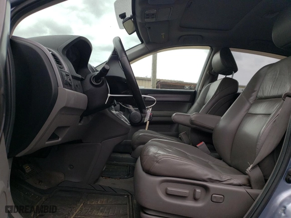 2009 Honda CR-V EX-L with VIN JHLRE48799C013166, listed as a Copart auction lot 52536345 with 202,259 mi miles and Salvage Title. Bid and sale history available at carsss.com. Image 7.