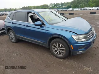 2018 Volkswagen Tiguan SEL z VIN 3VV2B7AX9JM020223, wystawiony jako IAAI lot #42374853 z przebiegiem 57 440 mil mil oraz . Historia ofert i sprzedaży dostępna na DreamBid. Obrazek 1.