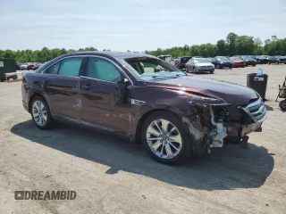 2011 Ford Taurus Limited with VIN 1FAHP2FW6BG157070, listed as a Copart auction lot 59300415 with 143,314 mi miles and Salvage title. Bid and sale history available at DreamBid. Image 4.