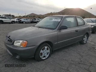 2001 Hyundai Accent GL with VIN KMHCG35C81U141661, listed as a Copart auction lot 84124804 with 38,318 mi miles and Clean Title. Bid and sale history available at carsss.com. Image 1.