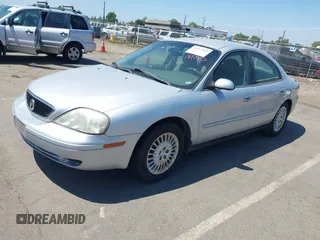 2002 Mercury Sable GS z VIN 1MEFM50U72A624825, wystawiony jako IAAI lot #42463081 z przebiegiem 88 873 mil mil oraz . Historia ofert i sprzedaży dostępna na DreamBid. Obrazek 2.