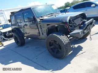2014 Jeep Wrangler Unlimited Sport with VIN 1C4BJWDG4EL295044, listed as a IAAI auction lot 41997837 with 143,447 mi miles. Bid and sale history available at carsss.com. Image 1.