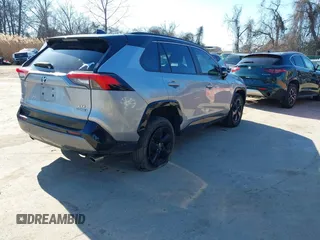 2021 Toyota RAV4 Hybrid XSE with VIN 4T3E6RFV7MU033736, listed as a IAAI auction lot 41640884 with 35,563 mi miles and . Bid and sale history available at DreamBid. Image 4.