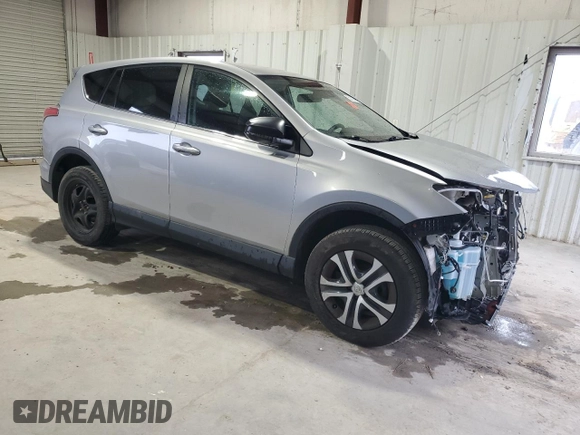 2018 Toyota RAV4 LE with VIN 2T3BFREV0JW781650, listed as a Copart auction lot 52123085 with 36,748 mi miles and Salvage Title. Bid and sale history available at carsss.com. Image 4.