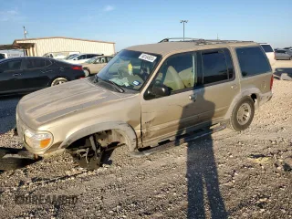 2000 Ford Explorer XLS z VIN 1FMZU72X0YZC33667, wystawiony jako Copart lot #80104924 z przebiegiem Nie podano mil oraz Szkody całkowita. Historia ofert i sprzedaży dostępna na DreamBid. Obrazek 1.