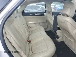 2014 Lincoln MKZ z VIN 3LN6L2GK9ER825882, wystawiony jako Copart lot #53332435 z przebiegiem 114 677 mil mil oraz Szkoda całkowita • Salvage title. Historia ofert i sprzedaży dostępna na DreamBid. Obrazek 10.
