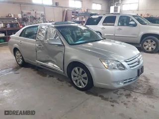 2005 Toyota Avalon XL with VIN 4T1BK36BX5U045813, listed as a IAAI auction lot 42061631 with 150,436 mi miles. Bid and sale history available at carsss.com. Image 1.