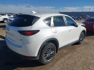2019 Mazda CX-5 Touring with VIN JM3KFACM4K1668352, listed as a IAAI auction lot 41481291 with 65,901 mi miles and . Bid and sale history available at carsss.com. Image 4.