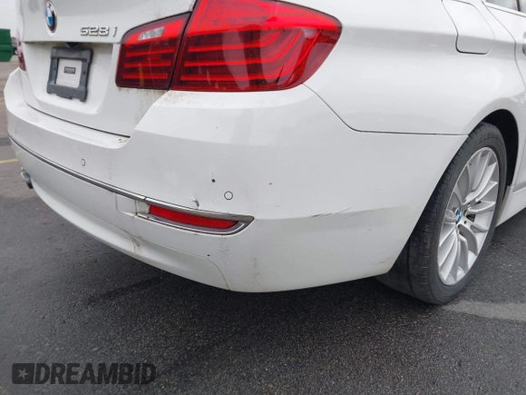 2015 BMW 5 Series 528i with VIN WBA5A5C5XFD516999, listed as a IAAI auction lot 41195184 with 131,187 mi miles. Bid and sale history available at carsss.com. Image 6.