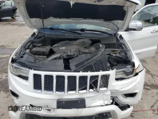2015 Jeep Grand Cherokee Overland with VIN 1C4RJFCGXFC891616, listed as a Copart auction lot 61386065 with 90,011 mi miles and Salvage title. Bid and sale history available at DreamBid. Image 12.