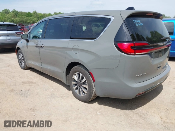 2023 Chrysler Pacifica Hybrid Touring L with VIN 2C4RC1L73PR522988, listed as a IAAI auction lot 42280263 with 54,939 mi miles and . Bid and sale history available at DreamBid. Image 3.
