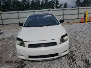 2005 Scion tC z VIN JTKDE177450007075, wystawiony jako Copart lot #57211935 z przebiegiem 205 619 mil mil oraz Szkody całkowita. Historia ofert i sprzedaży dostępna na DreamBid. Obrazek 5.