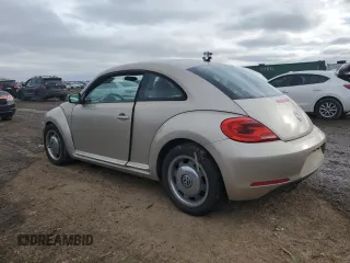 2012 Volkswagen Beetle 2.5L with VIN 3VWJX7ATXCM642807, listed as a Copart auction lot 42936475 with 100,678 mi miles and Salvage Title. Bid and sale history available at carsss.com. Image 2.
